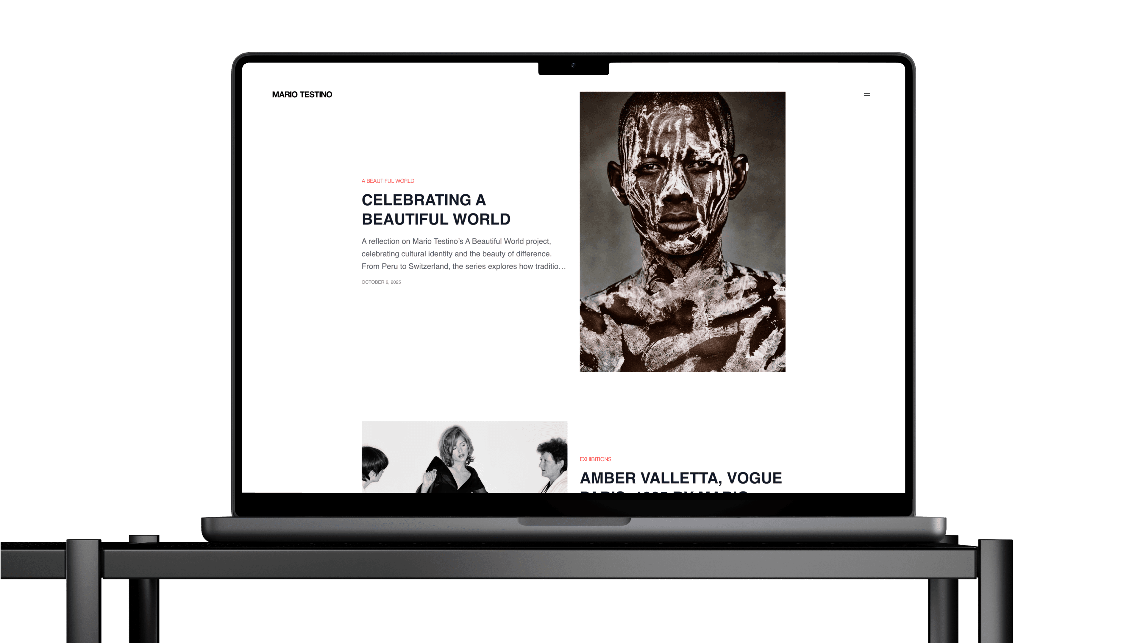 MacBook mockup showing Mario Testino website